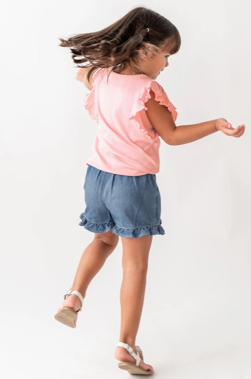 Model Wearing Rufflebutts and Ruggedbutts Light Wash Denim Ruffled Skort