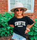 Load image into Gallery viewer, Girl wearing Taylor Swiftie Kids Graphic Tee Black 
