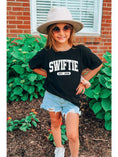 Load image into Gallery viewer, Girl wearing Taylor Swiftie Kids Graphic Tee Black
