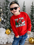 Load image into Gallery viewer, Toddler Boy wearing Sweet Wink Tis The Season Patch Christmas Sweatshirt
