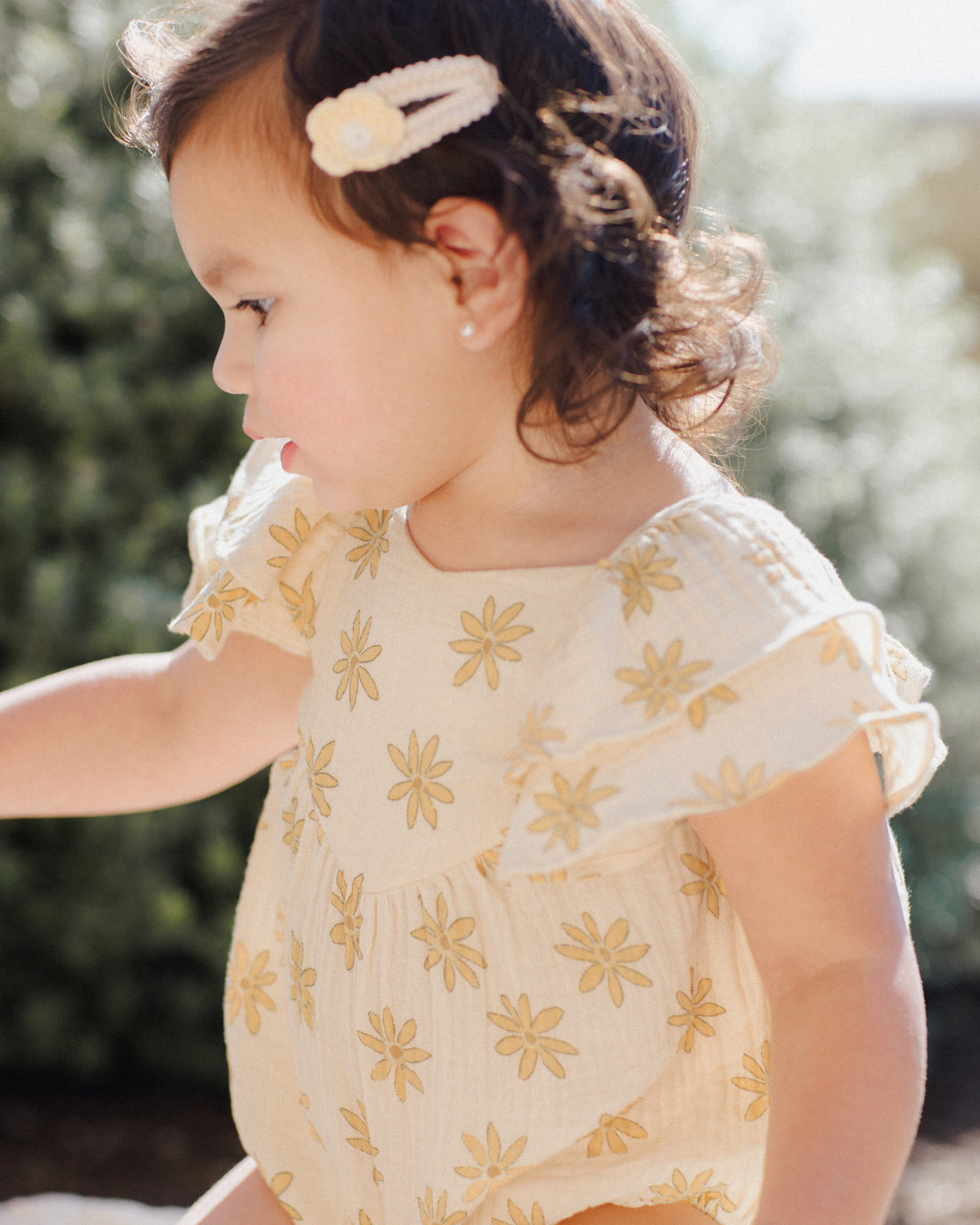 Model Wearing Rylee & Cru Roxy Romper || Daisies